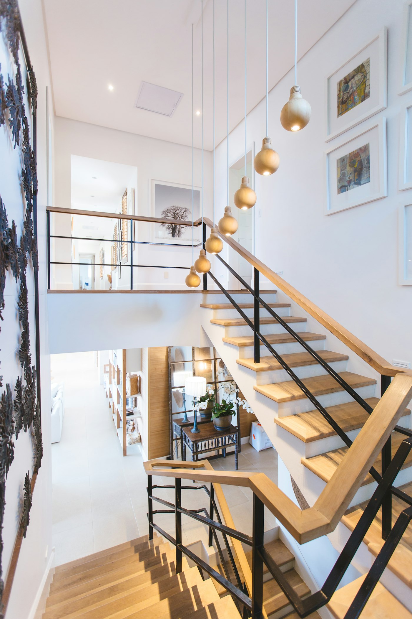 Finished interior oak-and-steel staircase in a renovated home
